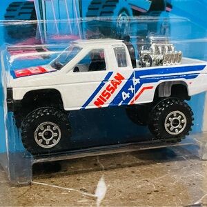 1989 Hot Wheels Trailbusters Nissan Hardbody #21 NOC
